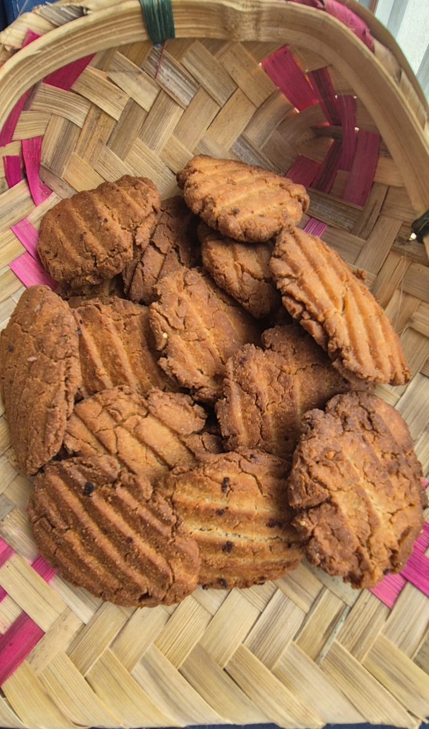 Freshly made Thekua in a traditional soop basket