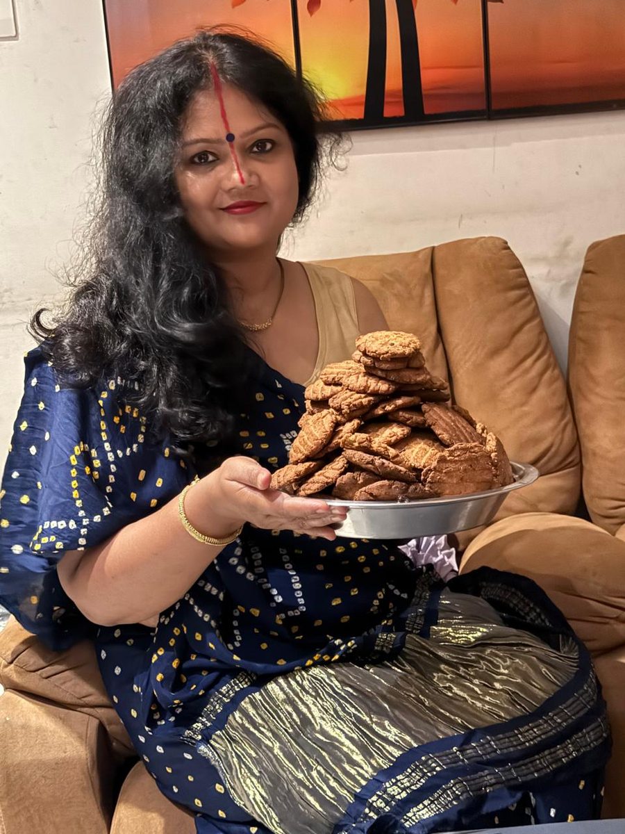 Rashmi with a plate of Thekua